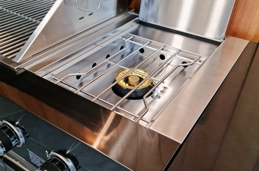 Stainless steel cooking surface and hood