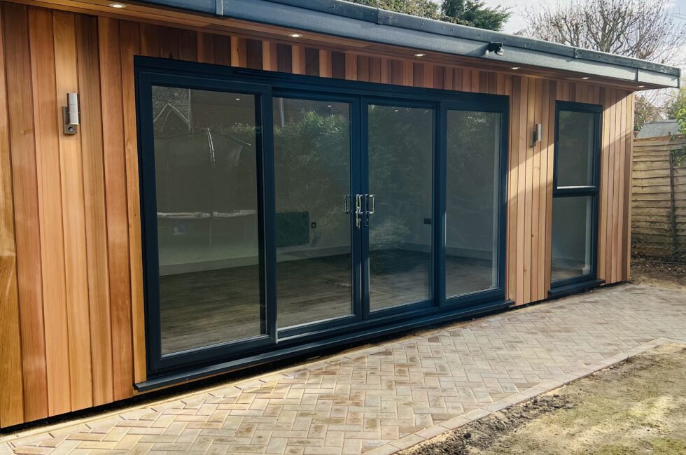 Bespoke 7m x 4m Cedar garden room, fully insulated and fitted.