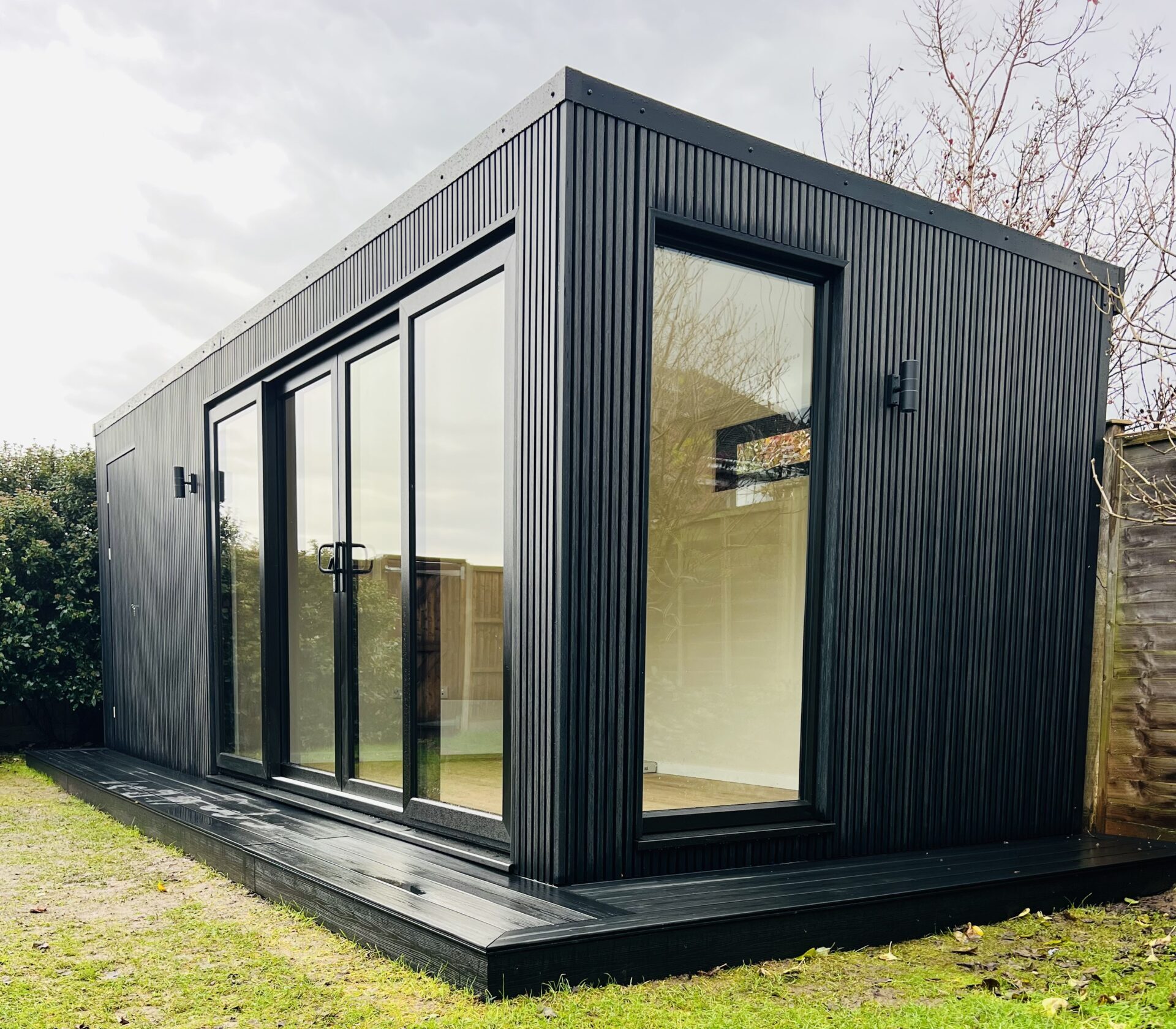 Ashton garden room — EcoScape Midnight slatted composite cladding