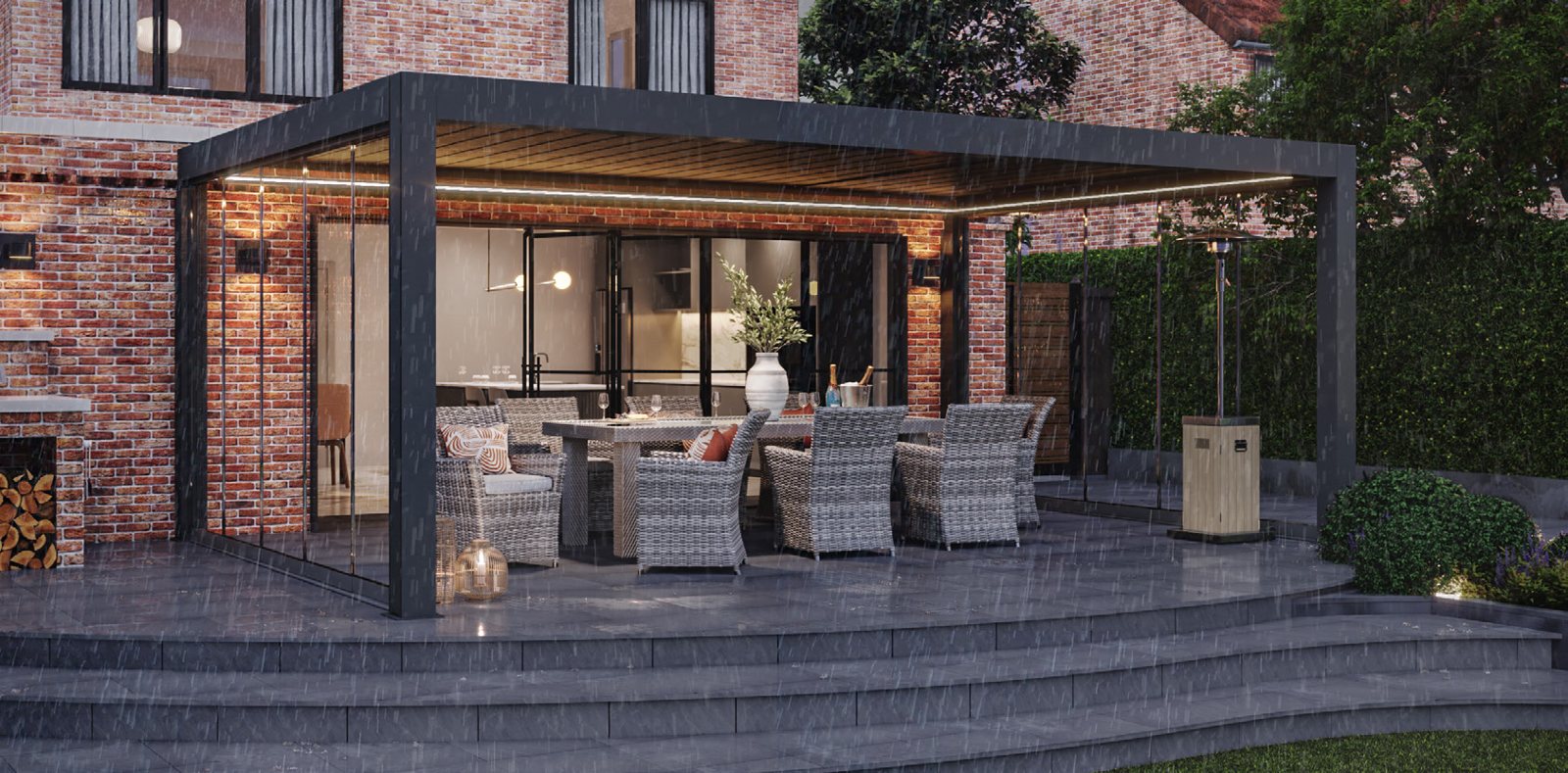 Wide bespoke aluminium pergola over a house patio with outdoor sofas at dusk