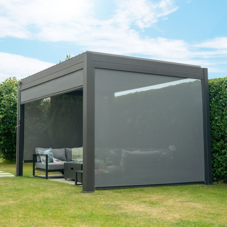 Grey aluminium pergola with a pull-down fabric privacy screen lowered on one side